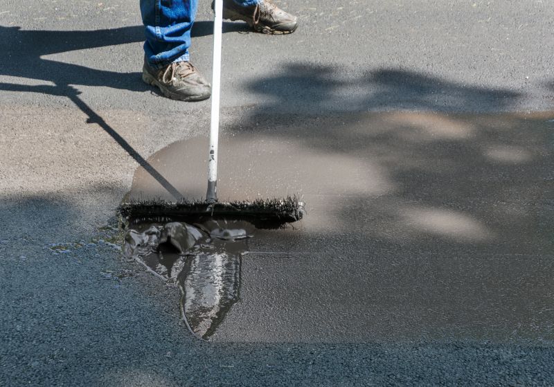 Applying Asphalt Sealant